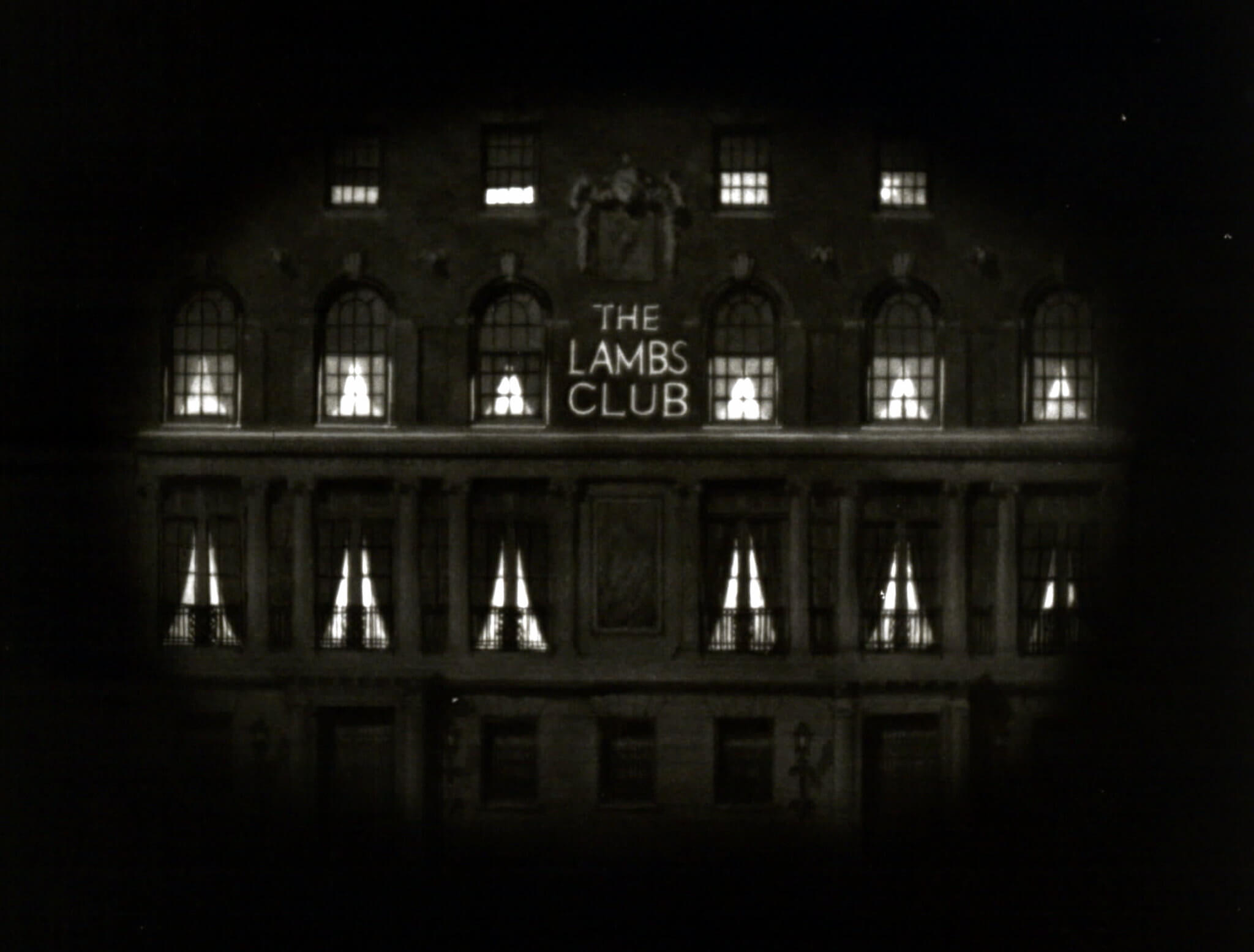 The Lambs Club building lit at night